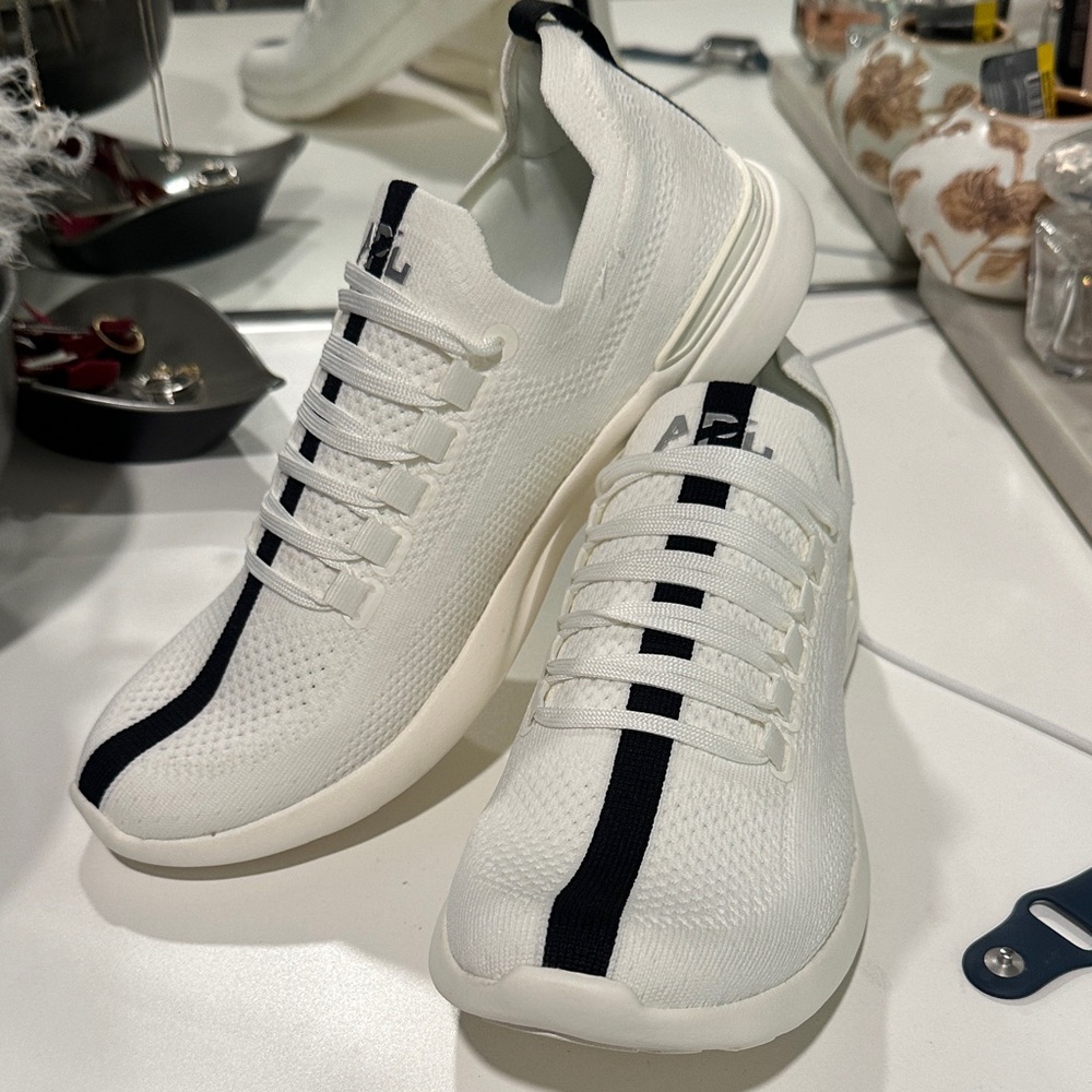 APL women’s white Sneakers with Black Stripe